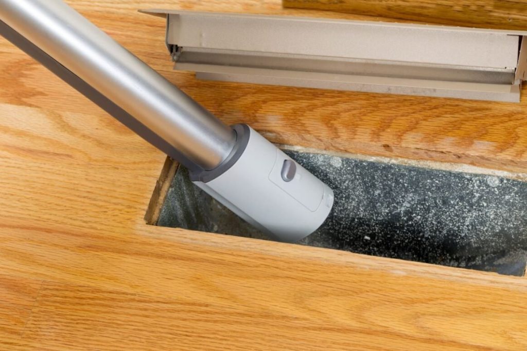 furnace duct cleaning vent cleaning inside hole